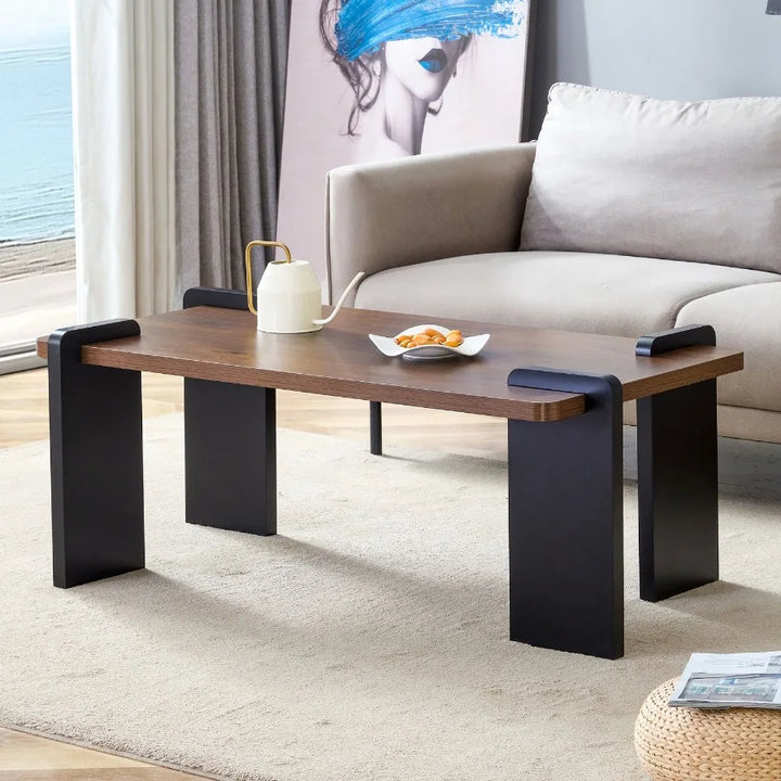 Walnutcolored MDF coffee table suitable for modern minimalist living rooms and leisure areas with product dimensions of 39.323.