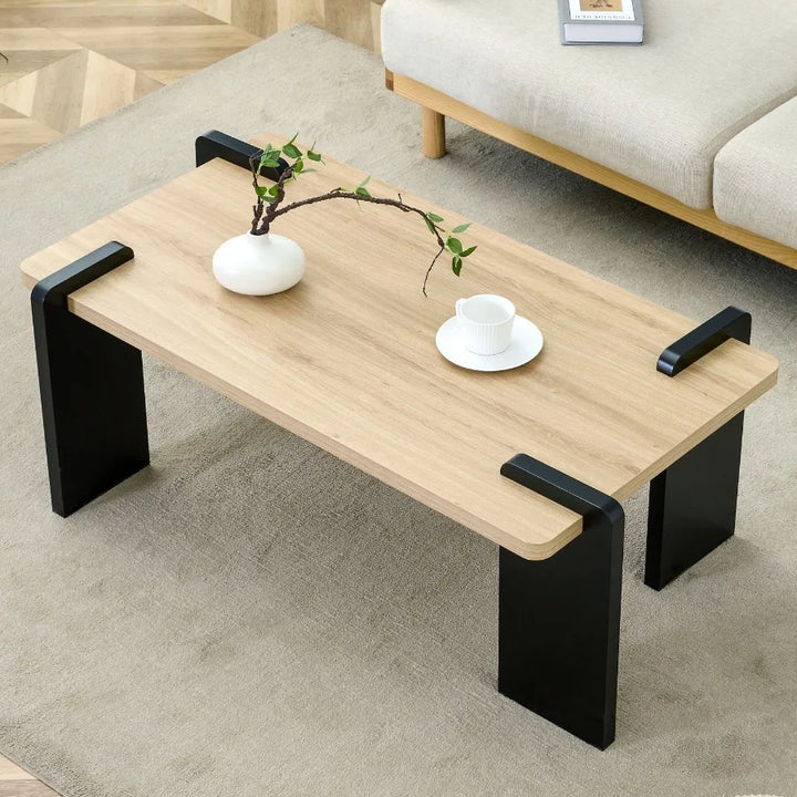 Natural wood colored MDF coffee table suitable for modern minimalist living rooms and leisure areas with product dimensions of
